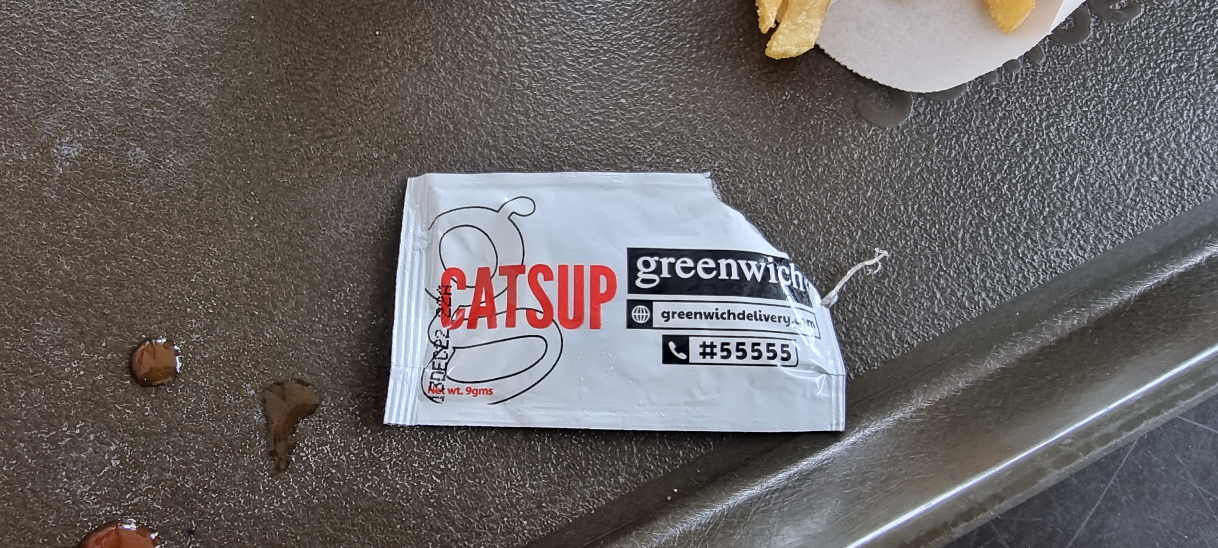 Catsup packet, side 1